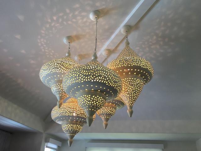 Ceiling light installation for a commercial space.