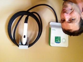 Electric vehicle charging station and outdoor electrical work.