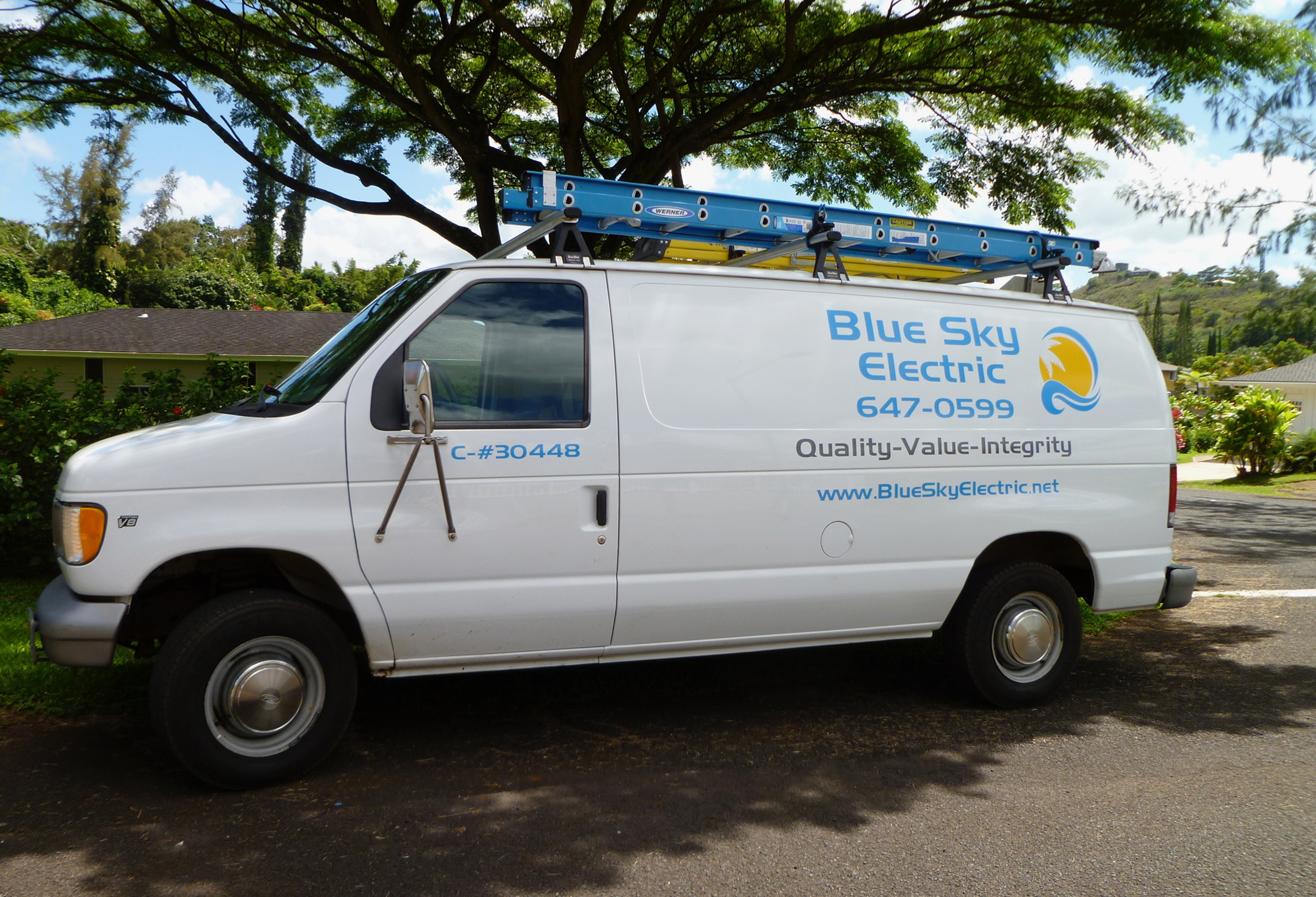 Blue Sky Electric work van in front of Kauai homes